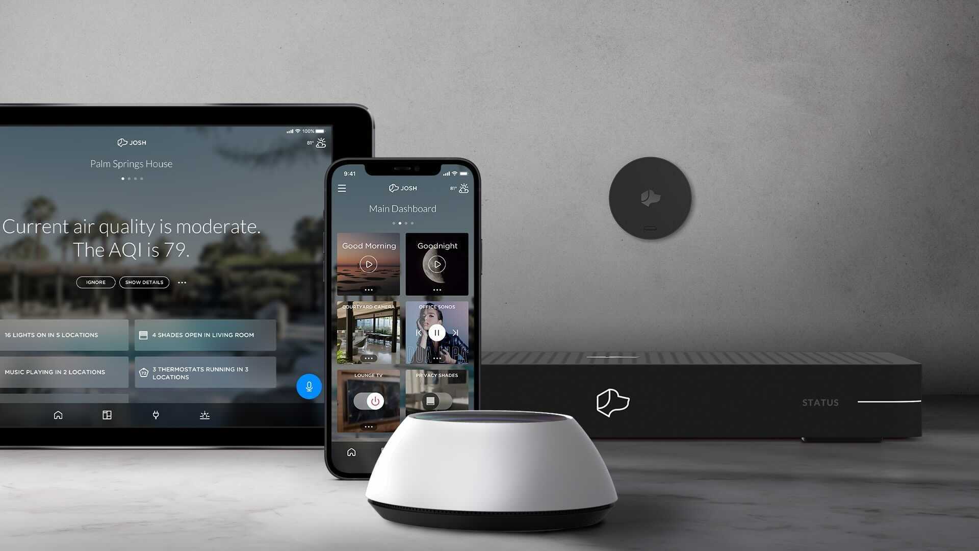 Woman using her computer in the kitchen counter drinking a glass of milk